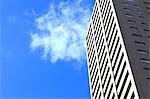 Mansion and the blue sky with clouds