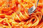 Spaghetti with tomato sauce and basil