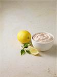 Bowl of taramasalata dip with lemon