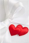 Satin hearts on gift box