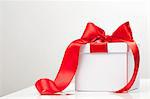 Red ribbon on gift box