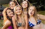 Portrait of five girls wearing bikini tops