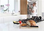 Man in kitchen, preparing food