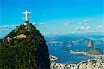 Christ the Redeemer statue overlooking Rio de Janeiro and Sugarloaf Mountain, Brazil