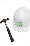 Hammer and hard with recycling symbol against white background