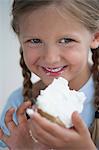 Girl eating piece of cake