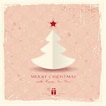 Simple paper Christmas tree with star on pale red distressed background with a filigree seamless snowflake pattern.
