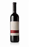 Bottle of red wine isolated on a white background.