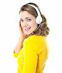 Attractive teenager tuned into music on her mp3 player