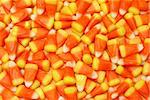A closeup of many pieces of candy corn.