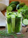 cucumbers in the jar with dill salt and pepper