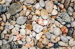 An image of a beautiful wet pebbles background