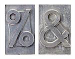 percent and ampersand -isolated symbols in vintage grunge metal letterpress printing blocks