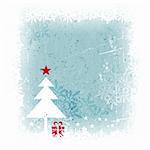 Grungy and frosty blue Christmas card with scratches, stains and snowflakes in the background and a simple Christmas tree with present and top star in the foreground.