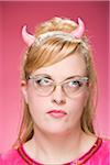 Portrait of Woman Wearing Devil Horns and Vintage Eyeglasses