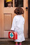 Girl playing doctor making house call