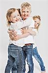 Smiling children hugging