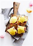 Sandwiches on wooden cutting board