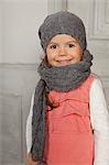 Smiling girl wearing hat and scarf