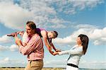 Family playing together outdoors