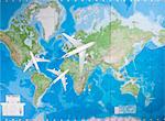 Model airplanes flying in different direction over world map