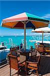 Chairs and Sun Umbrellas on Dock at Bar, Palm Beach, Aruba, Leeward Antilles, Lesser Antilles, Caribbean