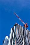 Construction crane and apartment building