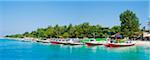 Gili Trawangan harbour, traditional boats on the crystal clear ocean at Gili Trawangan, Gili Islands, Indonesia, Southeast Asia, Asia