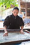 Woman making handmade paper in Luang Prabang, Laos, Indochina, Southeast Asia, Asia