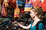 Tourist shopping on the Khaosan Road Market in Bangkok, Thailand, Southeast Asia, Asia