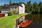 Skaly Mill with pond and boat, Slatinany, Pardubicko, Czech Republic, Europe