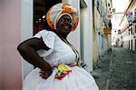 Bahian woman in traditional dress at the Pelourinho district, Salvador, Bahia, Brazil, South America