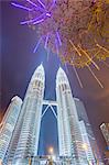 Low angle view of the Petronas Twin Towers, Kuala Lumpur, Malaysia, Southeast Asia, Asia