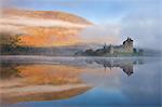 A misty autumn morning beside Loch Awe with views to Kilchurn Castle, Argyll and Bute, Scotland, United Kingdom, Europe