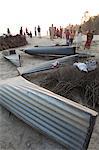 Small boats made from single sheets of corrugated iron, lying on the sandy banks of the River Hugli (River Hooghly), West Bengal, India, Asia