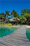 Wooden pier leading to a resort on Aore islet before the Island of Espiritu Santo, Vanuatu, South Pacific, Pacific