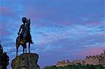 Royal Scots Greys Boer War memorial equestrian statue Princes Street, with the Royal Mile behind, Edinburgh, Scotland, United Kingdom, Europe