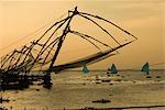 Chinese fishing nets at sunset, Kochi (Cochin), Kerala, India, Asia