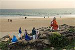Christian worshippers in evening, Chowara Beach, near Kovalam, Kerala, India, Asia