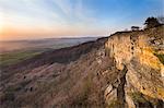 The setting sun illuminates Whitestone Cliff at Sutton Bank, North Yorkshire, Yorkshire, England, United Kingdom, Europe