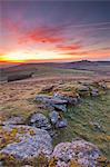 A colourful dawn on Chinkwell Tor in Dartmoor National Park, Devon, England, United Kingdom, Europe