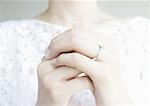Hand wearing a wedding ring