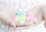 Hand holding hearts