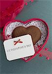 Chocolat en forme de cœur et une carte message