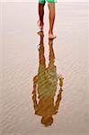 Boy's Legs Walking on Beach with Reflection, Rabat, Morocco