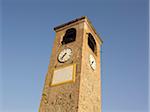 stone clock tower, Tuscany, Italy