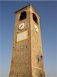 stone clock tower, Tuscany, Italy