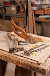 A work bench with old carpentry tools