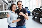 Young couple with car keys