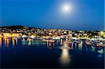 Aerial View on Illuminated Coast of Island Ciovo in the Night, Croatia